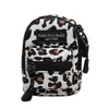 Coreano mini saco infantil comércio exterior popular leopardo impressão menina ombro mensageiro saco de viagem ao ar livre fone de ouvido saco boca envelope vermelho