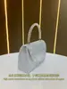 Bolso nuevo, elegante y deslumbrante para mujer, un bolso de noche chic con adornos de pedrería, un bolso tote versátil y un bolso de hombro único