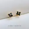 Pendientes de Flor de Zircón Negro de Lujo de Entrada Francesa Diseño para Mujer Exquisitos Pequeños Pendientes de Flor de Cuatro Hojas Regalo de Tanabata