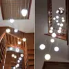 Lustre Minimalista Grande para Duplexes, Lustre Giratório em Forma de Seixo Estilo Chinês Novo para Escadas de Teto Alto, Loft Moderno de Villa com Teto Alto