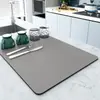 Tapete de drenagem de cozinha de cor sólida transfronteiriço, novo tapete de pia de mesa de terra de diatomáceas, tapete absorvente resistente ao desgaste, tapete de isolamento térmico anti-escaldante atacado