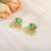 Pendientes de gota de agua geométricos verdes transfronterizos europeos y americanos para mujer, lujo ligero, elegantes, diseño de nicho, conjunto moderno y de alta gama al por mayor