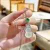 Collar para mujer con colgante bañado en plata con figura de Buda de calcedonia blanco hielo, diseños de hoja y calabaza, ágata y jade de Maitreya