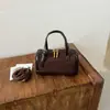 Bolsa de Camurça com Flocagem de Nicho Feminina 2026 Outono/Inverno Nova Versátil de Ombro Único Transversal Exquisita Super Popular Bolsa Almofada de Mão