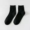 Calcetines de otoño e invierno para hombre, calcetines casuales de negocios para hombre, empaque individual, calcetines de algodón para hombre hasta la pantorrilla, calcetines absorbentes de sudor, transpirables, de color liso