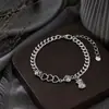 Pulsera de cuerda trenzada colorida de acero de titanio que no se decolora para hombre, pulsera de circón de lujo ligero de nicho de alta gama para mujer, joyería ajustable