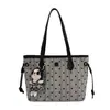 Bolso de mano elegante y de alta gama de gran capacidad para mujer, nueva colección 2026, adecuado para el trabajo diario, con diseño de lunares y rayas, y se puede llevar como bolso de hombro o bolso tote