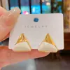 Pendientes Minimalistas Versátiles Geométricos Triangulares de Moda para Mujer con Diseño Único, Pendientes de Aguja de Plata, Nuevos Accesorios de Oreja de Moda 2025