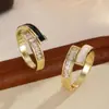 Anillo de diamante entrelazado de doble capa estilo ins europeo y americano con esmalte blanco y negro, anillo de circón de lujo ligero con un diseño único