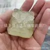 Venta al por mayor jade afgano natural ojo de gato pieza de danza del león mascota de juego hielo a través del colgante de cabeza de león colgante suministro en vivo