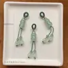 Precio mayorista directo de fábrica pulsera hecha a mano pulsera con colgante diy accesorios pequeños deslizantes colgante de garra de gato lindo Joker