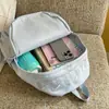 Mochila escolar estilo Ins para estudiantes de secundaria femeninas, gran capacidad, mochila casual de tela de nailon de gran capacidad para estudiantes de preparatoria femeninas