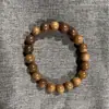 Pulsera de Sándalo Dorado Cadena de Mano Cuentas Budistas DIY Pareja Hombre y Mujer Lugar Escénico Puesto de Mercado Nocturno Fabricante Mayorista