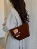 Bolsa de bowling coreana de nicho em formato de coração para mulheres, nova bolsa tote transversal simples e versátil 2026, bolsa de mão para o dia a dia