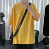 Suministro directo de fábrica marca de moda camiseta de manga corta de color liso para hombre estilo coreano holgada básica combinable para todo estudiante media manga
