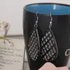 Recolección Transfronteriza de Pendientes Metálicos con Hojas Geométricas Escarchadas, Ganchos para Orejas Creativos Personalizados con Borla de Hoja Redonda Hueca