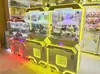 Máquina de garra comercial, máquina de gashapon, máquina de garra de snacks para niños, caja sorpresa de llavero de muñeca, máquina de muñecas de monedas