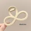 Pinza para el cabello de tamaño mediano de lunares blancos y negros estilo francés, diseñada para la parte trasera de la cabeza, un accesorio para el cabello nuevo y elegante con un aspecto sofisticado y con estilo