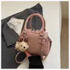 Bolsa de almohada transfronteriza para mujer 2026 Nuevo estilo Moda Popular Temperamento Bolsa de boliche Elegante Bolso de mano para hombro Cruzado Moderno