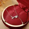 Collar de Mariposa Camelia para Mujer Simple Nuevo Diseño de Nicho Sentido de Diseño Lujo Ligero Cadena para Clavícula Borla Nueva Versátil Moda