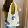 Bolsa de Ombro Única Vazada Tecida à Mão Feminina Transfronteiriça Nova Bolsa Tote Bolsa de Praia Grande Capacidade Bolsa de Mão Fashion