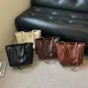 Bolso tote de lujo ligero transfronterizo con textura vintage, bolso de mano de moda para mujer, de gran capacidad, nicho, muy vendido