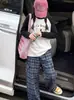 Conjunto de Camiseta de Manga Larga para Niñas para Primavera y Otoño 2026 Nuevo Estilo Ropa de Otoño para Niñas Grandes Pantalones Casuales a Cuadros Modernos