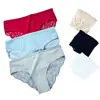 Ropa interior sexy de encaje europea y americana para mujer 40 hueca semitransparente de malla con refuerzo de algodón para mujer, bragas de encaje para niñas