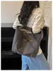 Bolso de lona texturizada de gran capacidad patchwork casual vintage modelo nuevo 2026 bolso de hombro simple versátil para mamá y para ir al trabajo
