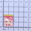 Rosa Dibujos Animados Kt Juguete de Comida Gato Chocolate Resina Accesorios Pegamento de Crema DIY Funda de Teléfono Pasador Imán para Nevera Venta al por Mayor