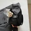 2026 Nova Bolsa Transversal Estilo Coreano Inspirada na Chanel com Pingente de Laço para Mulheres, Bolsa de Mão e Bolsa de Ombro Versátil de Alta Moda