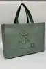 En stock tienda de ropa con logo impreso bolsa de tienda con nombre de tienda impreso tela no tejida bolsa en stock bolso de mano empaque publicitario bolsa laminada