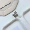 Anillo de corona estilo vintage con forma de corazón y cruz, flor de iris para mujer, nuevo anillo abierto versátil de moda artístico y genial