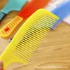 Suministro directo de fábrica para el hogar pequeño A9 peine de plástico para el cabello puesto de venta al por mayor color Jianghu peine de pelo inclinado