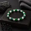 Pulsera para hombre de estilo europeo y americano con cruz incrustada de diamantes, acero de titanio, no se decolora, joyería versátil de alta gama, accesorio de nicho moderno para mujer