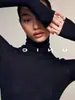 Elegante y sofisticada capa base de punto de cuello alto para mujer, perfecta para otoño e invierno. Este elegante y hermoso suéter de corte ajustado presenta un diseño único de cuello con volantes