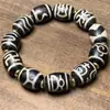 Al por mayor estilo Xizang intemperie alto en aceite ágata viejo nueve ojos bendición familiar pulsera Tianzhu ágata pulsera Tianzhu Duobao