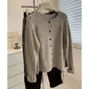 Suave cárdigan de punto con cuello redondo estilo coreano 100% lana pura, un suéter versátil y de corte holgado para usar en capas en otoño e invierno.