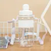 Taza de Agua de Plástico con Paja y Correa Impresa de Moda Sellada a Prueba de Fugas Taza de Agua para Estudiantes Portátil Taza de Agua para Fitness al Aire Libre