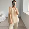 Camiseta plisada de verano para mujer, nueva moda Miyake, cara redonda, camisa holgada, ajustada e irregular, una generación de cabello
