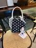 Bolsa de mano de lunares estilo coreano, un bolso versátil y moderno de gran capacidad, perfecto para el trabajo y los desplazamientos.; disponible al por mayor