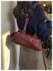 Bolsa de boliche de temperamento fashion nicho feminina nova casual bolsa travesseiro diária retro bolsa de ombro único sob o braço