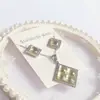 Nuevo especial transfronterizo explosión de tendencia europea y americana titanio acero alta calidad color collar pendientes traje femenino joyería de concha real