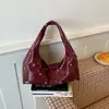 Bolso de Mano de Moda con Diseño de Nicho Verano 2026 Casual Personalidad Bolso de Hombro Simple Exquisito Moderno Bolso con Remaches para Mujeres