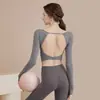 Ropa de yoga para mujer 2024 otoño e invierno nueva con almohadilla en el pecho manga larga ajustada deportiva para correr top ropa de fitness para mujer al por mayor