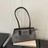 Estilo coreano transfronterizo Gran capacidad Dropshipping 2026 PU Moderno Simple Casual Gran capacidad Bolso de hombro tipo baguette para ir al trabajo