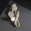Broche único de perlas con diseño de corazón 2024 nueva moda otoño e invierno corsage accesorios de alfiler delicados para mujer Corea del Sur