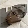 Bolsa Baguete de Mão Estilo Casual Retrô para Mulheres 2025 Inverno Nova Estilo Coreano Versátil Simples Bolsa de Ombro Transversal
