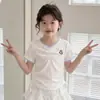 Conjunto de Verano 2026 para Niñas Nuevo de Moda Camiseta de Manga Corta con Cordón y Falda de Lunares de Varios Niveles Conjunto de Dos Piezas para Niños Mayores