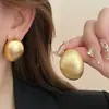 Clip para Oreja Metálico Mate Lujo Accesible Gama Alta Exagerado Elegante Pendientes Sin Perforar 2024 Nuevo Estilo Caliente Dorado Curvo